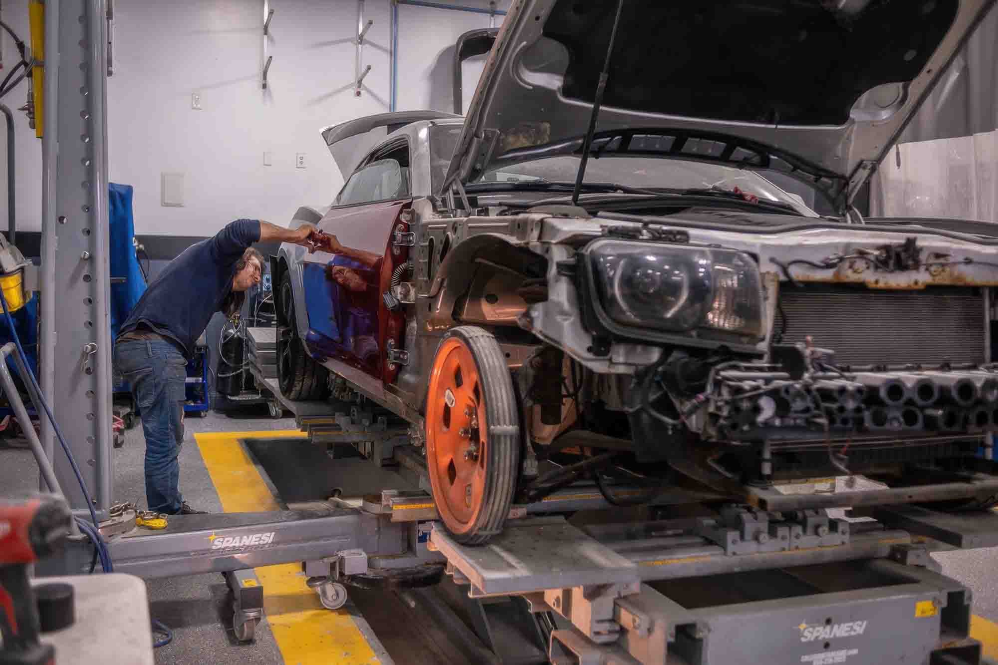 Apex Auto Center structural tech working Apex Auto Center structural tech working