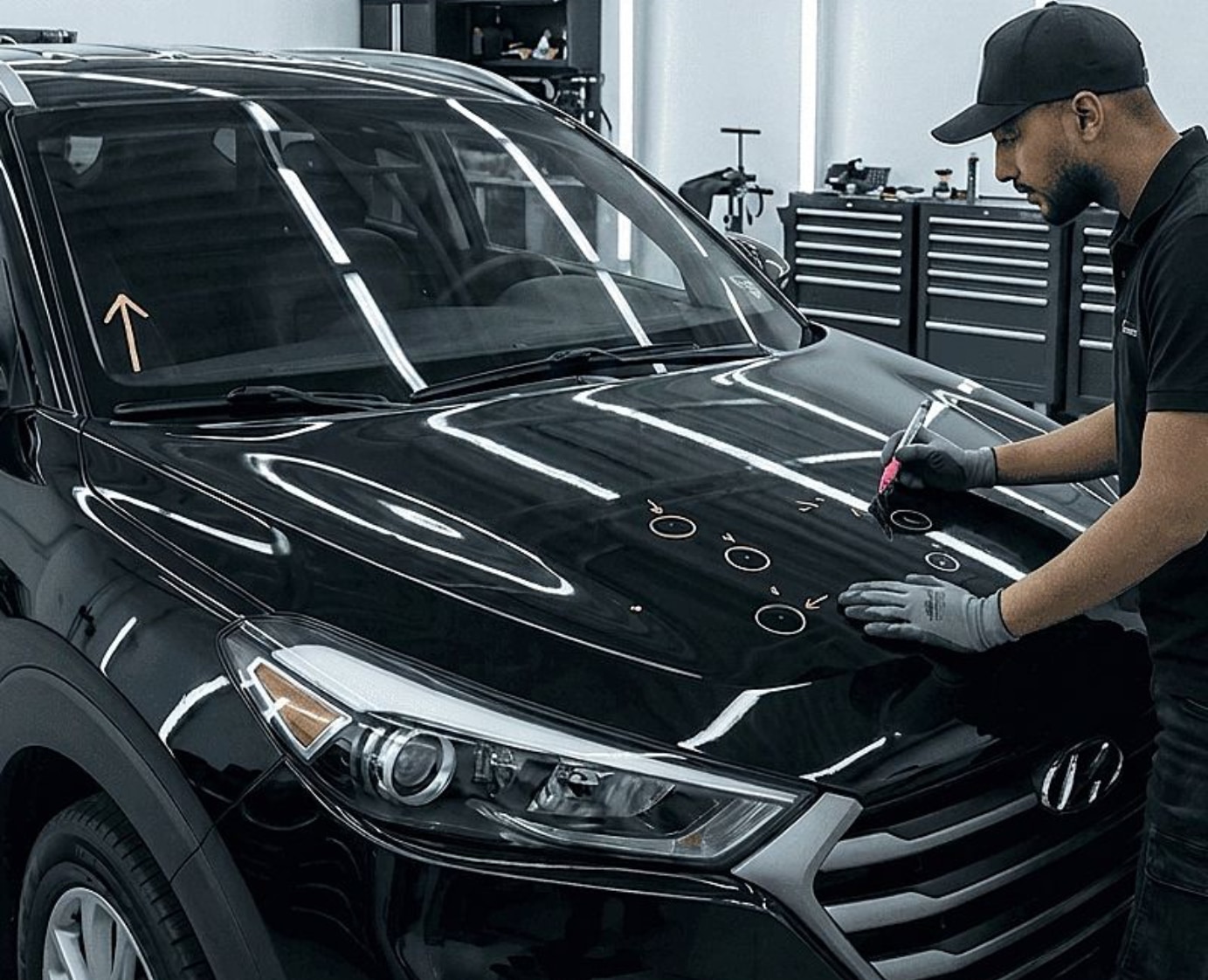 Paintless Dent Repair tech identify damage